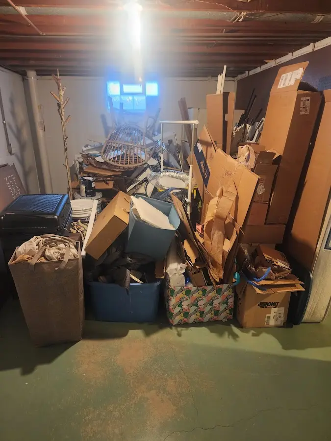 Roll-off dumpster container at job site for 6 Yard Dumpster Rental in Conklin